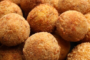 Delicious fried croquette balls as background, closeup