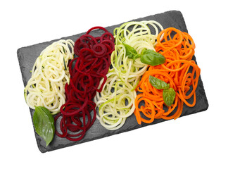 Different vegetable noodles with basil isolated on white, top view. Vegetarian dish