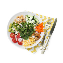 Different healthy vegetarian food and cutlery isolated on white, top view