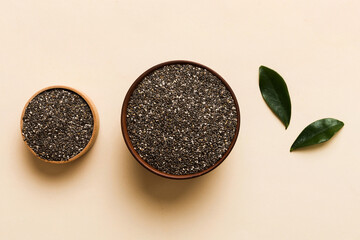 Chia seeds in bowl on colored background. Healthy Salvia hispanica in small bowl. Healthy superfood