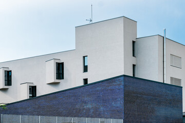 Sustainable urban property: A modern residential or office building with an energy-efficient facade.