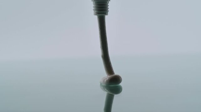Close-Up of Toothpaste Being Squeezed from a Tube