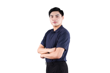 Confident Young Professional: A sharply dressed young man with a confident, self-assured demeanor, stands with crossed arms, exuding a sense of authority and capability.