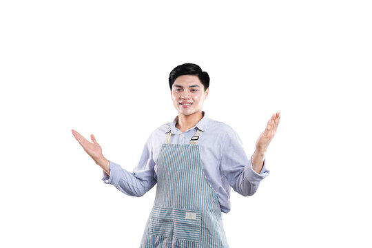 Welcoming with Open Arms: A friendly individual, dressed in a professional apron, extends both arms in a gesture of welcoming, inviting, and embracing.