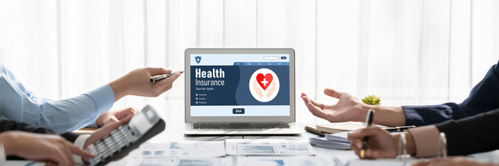 Business intelligence and data analysis concept. Analyst team working on financial data analysis dashboard on laptop screen as marketing indication for effective business strategic planning. Insight