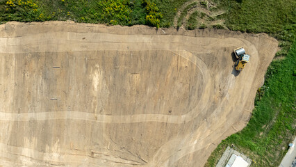 Aerial View of Construction Site with Bulldozer