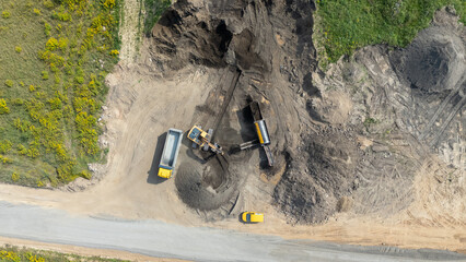 Aerial View of Construction Site with Heavy Machinery