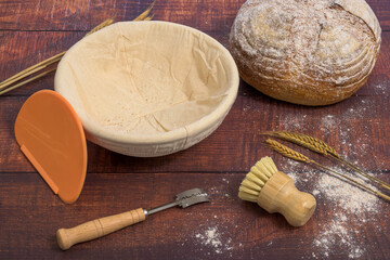 Traditional Bread baking tools lying on a wooden table