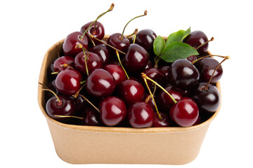 Fresh sweet cherries in cardboard basket, isolated on transparent background, PNG