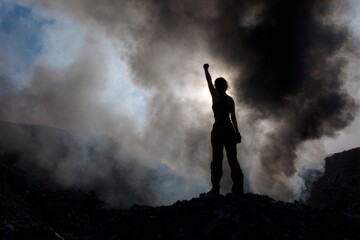 Activist and smoke-filled mine create powerful visual statement. Personal cost. Eastern europe and central asia: abuse claims in mining sector triple. Abuse allegations. Sustainable mining.