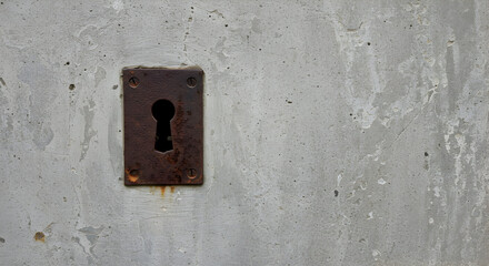 Rustic Keyhole on Weathered Concrete Wall Texture Background