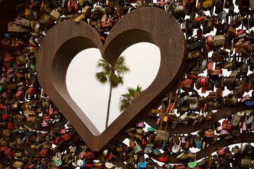Heart shaped structure holds love locks