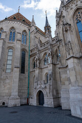 Fototapeta premium Church of the Assumption of the Buda Castle or Matthias Church or Coronation Church of Buda is catholic church in Holy Trinity square in Buda Castle District, Budapest, Hungary. Vertical image
