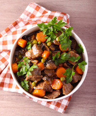 stew with mushrooms, carrot and peas