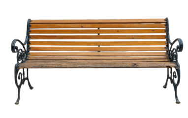 Wooden park bench with ornate wrought iron