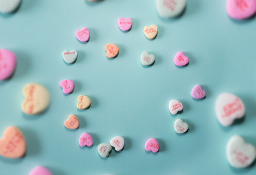 heart shaped candies in circle top view