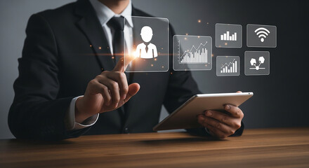 Businessman using digital tablet with futuristic interface icons for analytics data network cloud and technology innovation in corporate strategy planning

