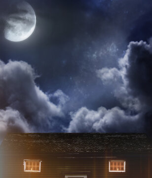 night sky with clouds spooky roof top