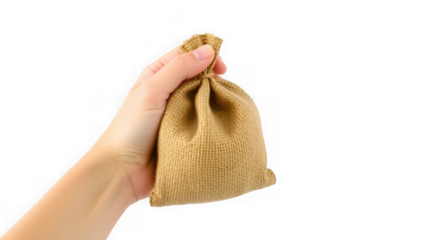 A persons hand holding a small, tied burlap sack isolated against a transparent background