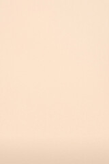 Soft peach background with subtle texture and gradient