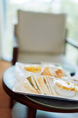 Delicious healthy sandwich platter served on a table, perfect for a light meal or snack, featuring fresh ingredients and a cozy ambiance