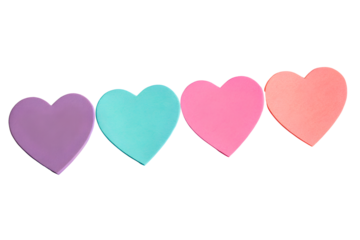 PNG image of Four colorful heart-shaped sticky notes in a row, isolated on a white background.
