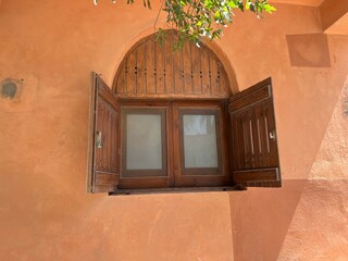 Beautiful unusual wooden window with shutters on the wall of the house El Gouna, Hurghada, Red Sea, Egypt, North Africa