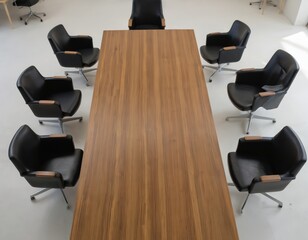 Modern office space with wooden desk, laptop, keyboard, white board, computer monitor and phone. Gray floor, white walls, black chair in collaborative workspace.