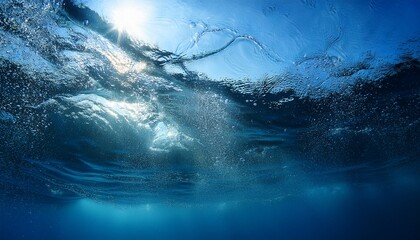 waves create a mesmerizing underwater view with bubbles and light reflections in clear blue water