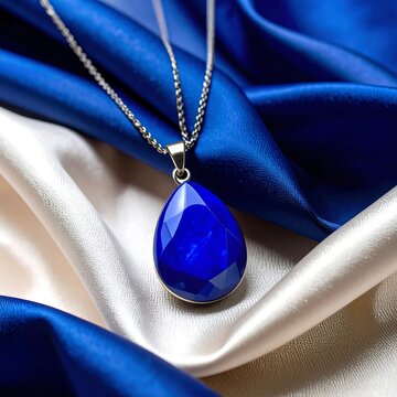 Blue gemstone pendant on silk (1)