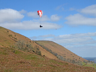 Paraglider in the hills above Pandy in Wales