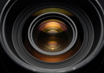 Extreme close-up of a camera lens showing detailed glass and aperture