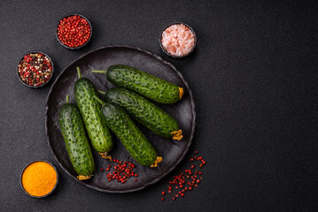 Fresh raw whole cucumbers, an ingredient for preparing salads and vegetarian dishes. Green fresh cucumbers