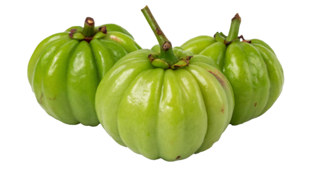 Three green garcinia cambogia fruits isolated on transparent background