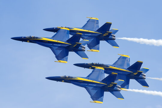 Blue Angels Boeing F/A‑18 Super Hornets flying in formation over Mather Field, California, United States, March 23, 2025.