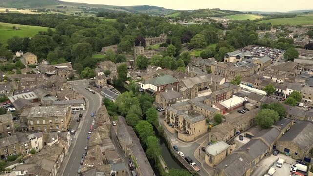 Aerial Video of Skipton church and Castle.  The town still keeps its essentially medieval layout dominated by the magnificent castle, parish church, and traditional high street market place .