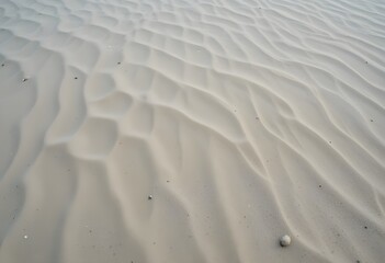 Abstract close-up of natural sand dunes or rippled desert waves. Minimalist, serene, and textured background for nature, travel, or tranquility.