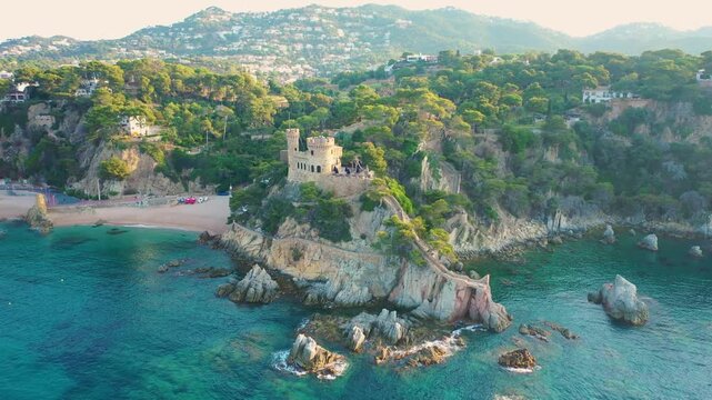 Aerial 4K video from drone to castell d'en plaja castle lloret de mar in costa brava, spain