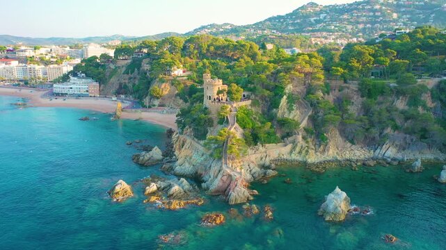 Aerial 4K video from drone to castell d'en plaja castle lloret de mar in costa brava, spain