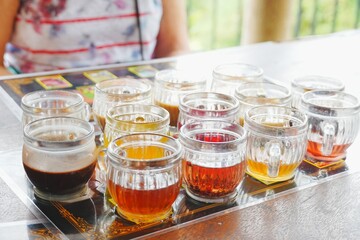 Selection of colourful coffee and tea tasting glasses in Bali, Indonesia