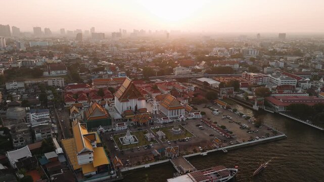 Aerial view of wat kalayanamit woramahawihan temple on chao phraya river in Bangkok. 