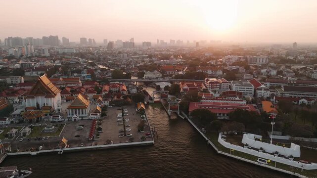 Aerial view of Phra sumen fort and wat kalayanamit woramahawihan temple on chao phraya river in historic Bangkok landscape, Thailand.