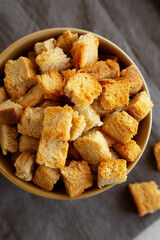 Homemade Crispy Bread Croutons in a Bowl, top view. Close-up.