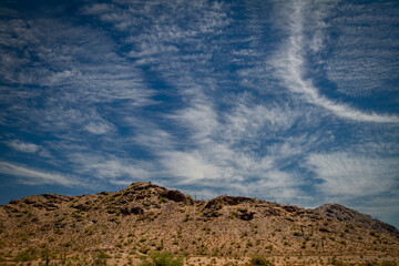 Desert Hills with a dramatic blue sky and clouds