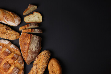 Freshly Baked Artisan Bread displayed on a dark background, highlighting its craftsmanship