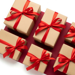 Obraz premium Bold composition of eco-friendly kraft gift boxes tied with satin red ribbons, neatly arranged over a deep crimson background. Overhead softbox light enhances texture and depth copy