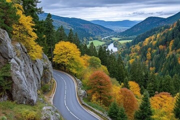Winding road through colorful autumn forest in the black forest, germany © Lubos Chlubny
