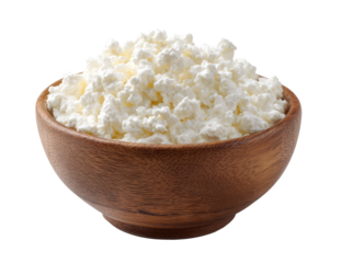 Creamy, crumbly white cheese in a wooden bowl