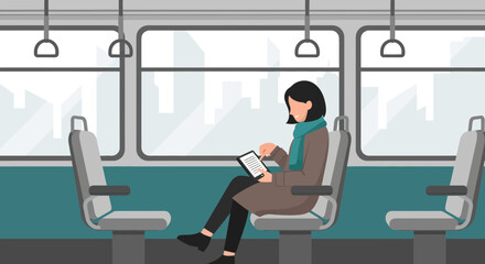 Fototapeta premium Woman Commuting Using Tablet on the Train During her Daily Commute