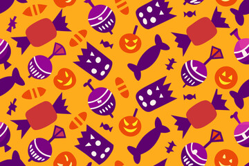 Colorful Halloween candy pattern on orange background  